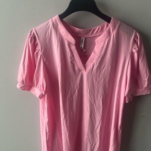 Barbie Pink short sleeve; polyester; V neck - wear with everything!